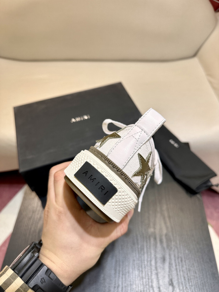amiri* appliquéd leather and canvas sneakers