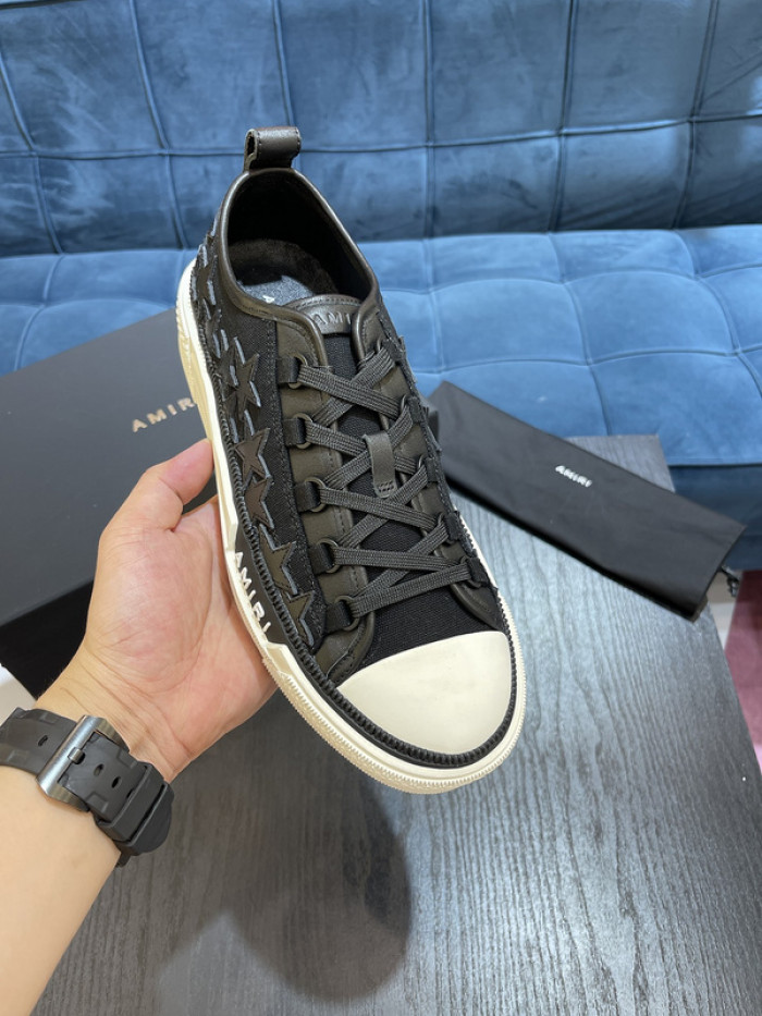 amiri* appliquéd leather and canvas sneakers